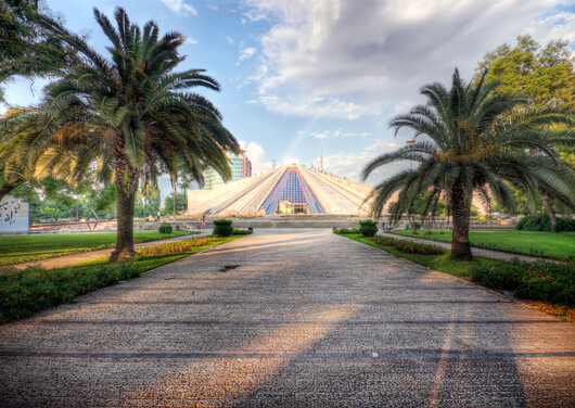 TIRANA%20-%20ALBANIA__DEST_ALBANIA_HOXHA_PYRAMID_TIRANA_GettyImages-182174389_Universal_Within%20usage%20period_93801%20(1).jpg