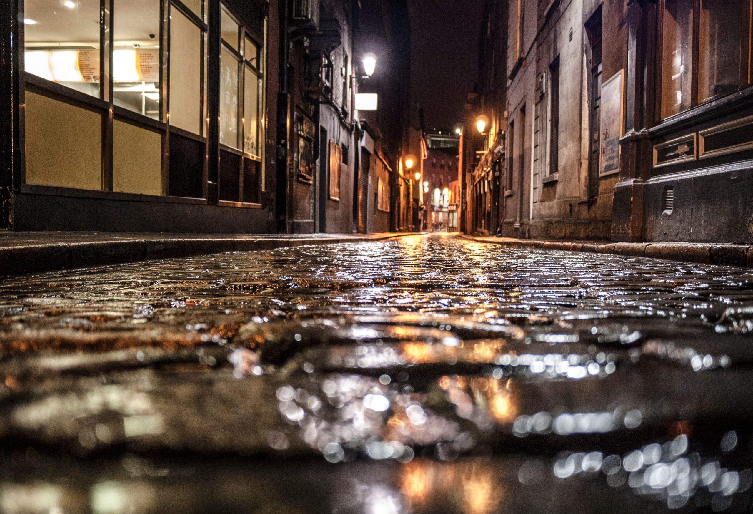 Dark paved alley at night in Dublin, ireland