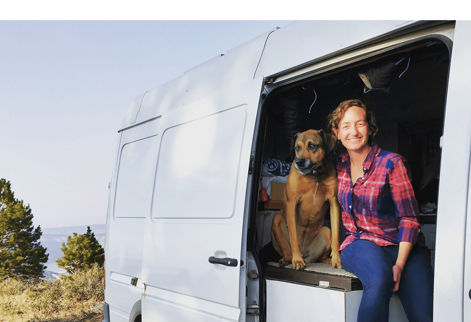 Jenny and her dog Dakota in the van.