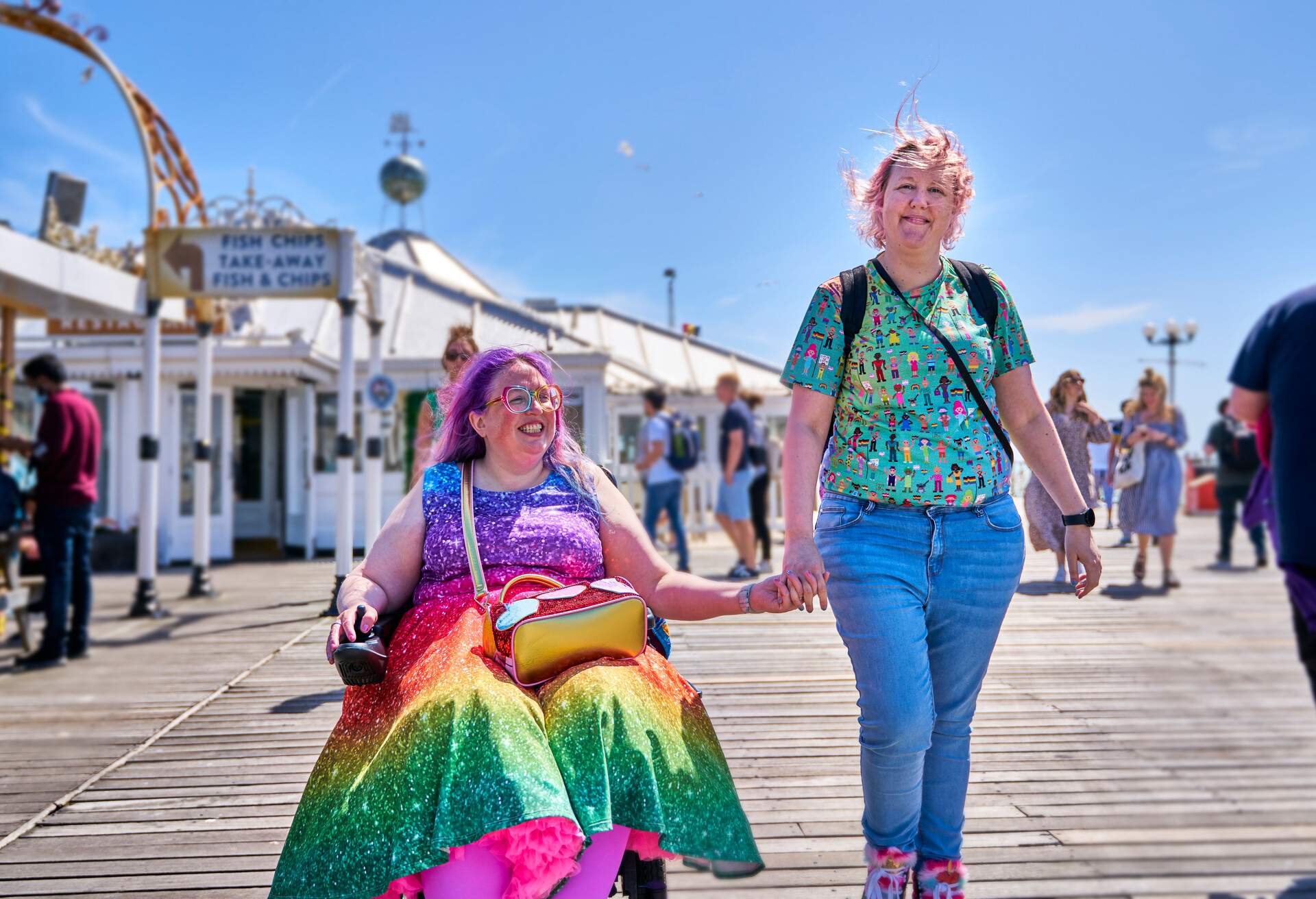 THEME_PEOPLE_LGBTQ_COUPLE_PRIDE_WHEELCHAIR_DISABILITY_GettyImages-1408208683