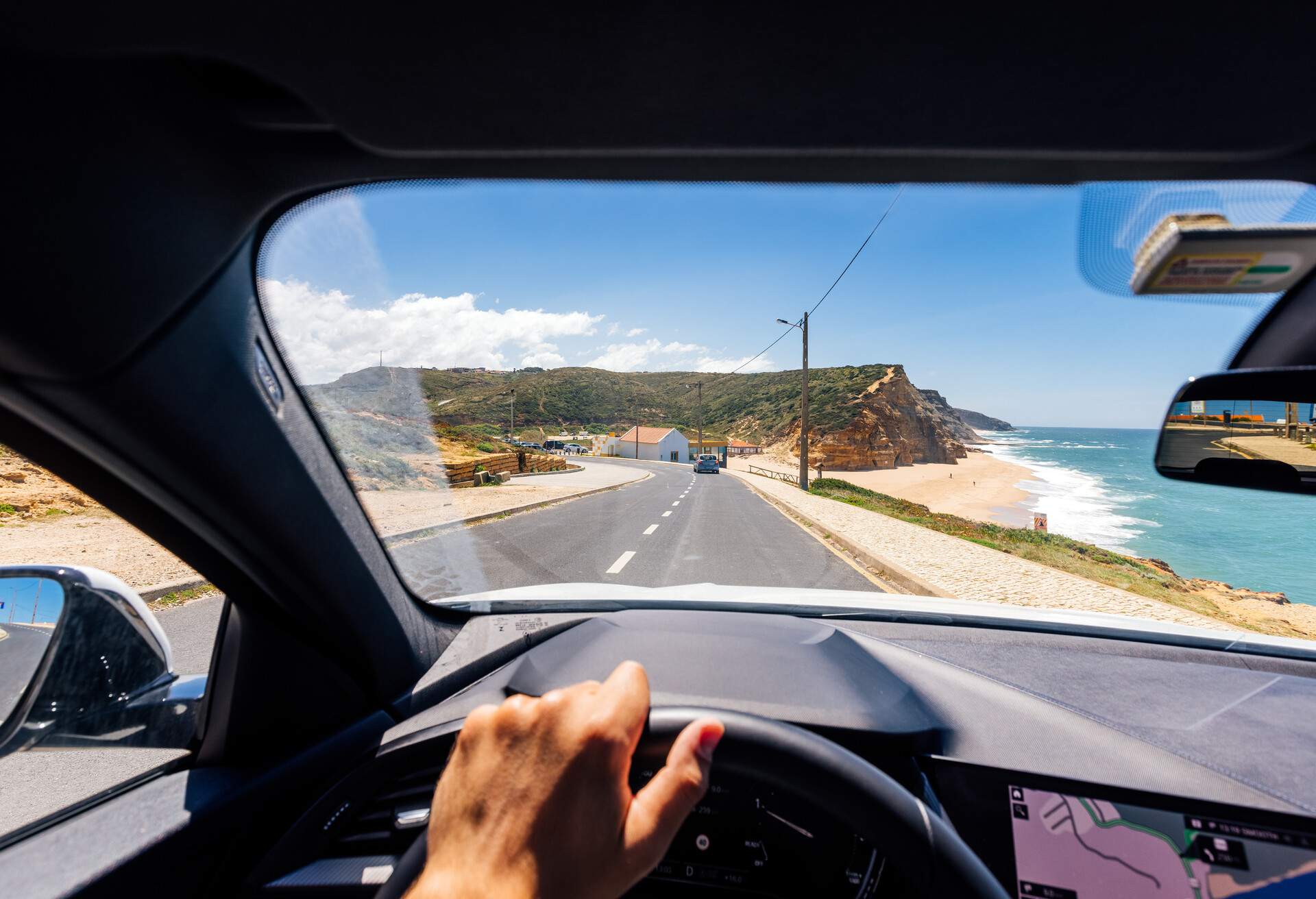 dest_portugal_theme_beach_car_gettyimages-1397617471_universal_within-usage-period_83067