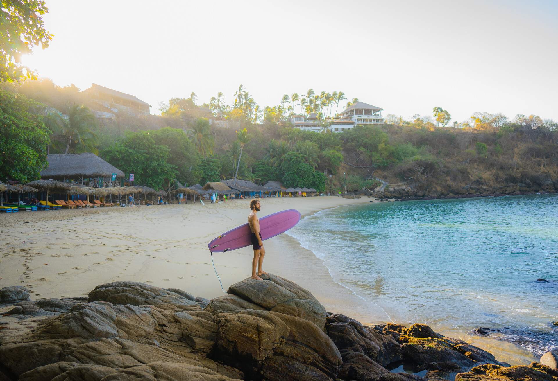 DEST_MEXICO_PUERTO_ESCONDIDO_SURFER_GettyImages-1397902943.jpg