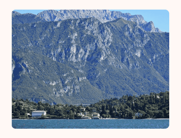 Mountains jut up to Lake Como in Italy.