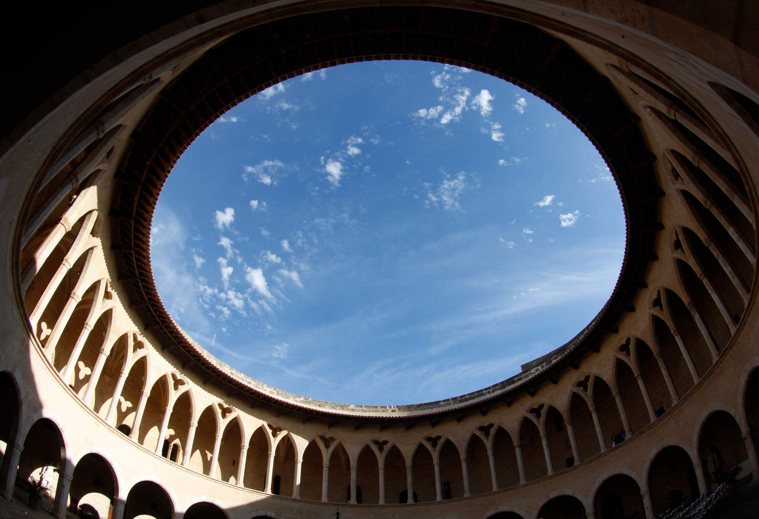 A circular inner courtyard with pillared hallways.