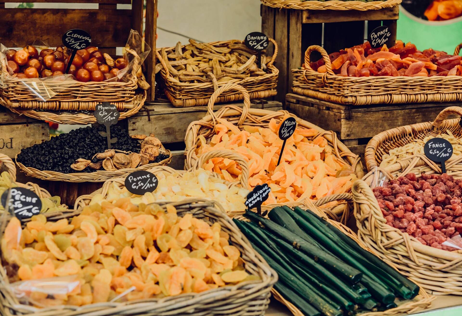 Dried fruits and vegetables displayed at food market in Paris, France