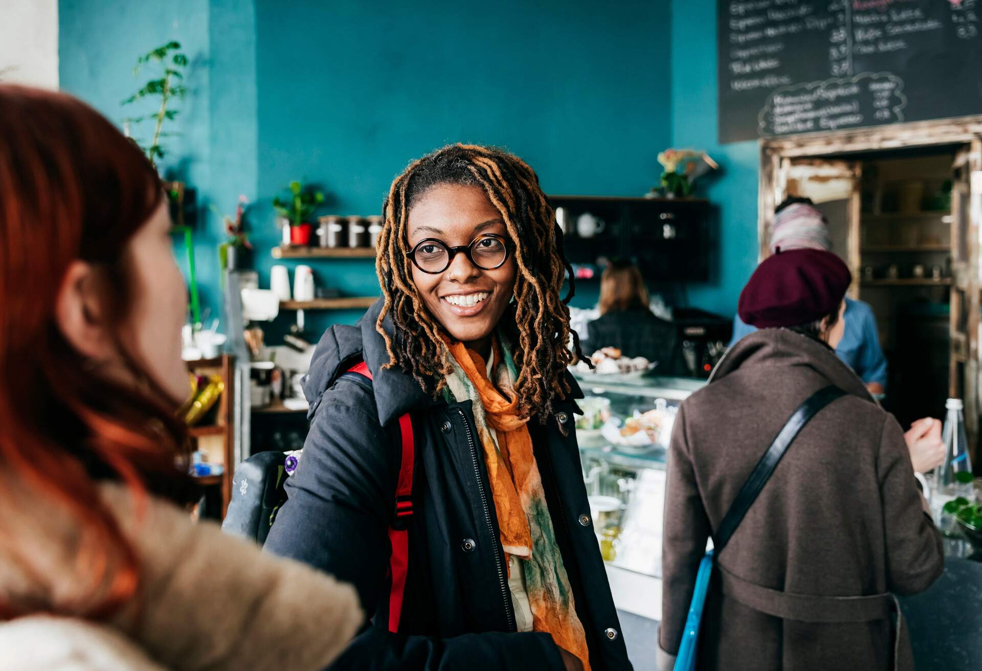 DEST_GERMANY_BERLIN_THEME_CAFE_PEOPLE_GettyImages-1213478930