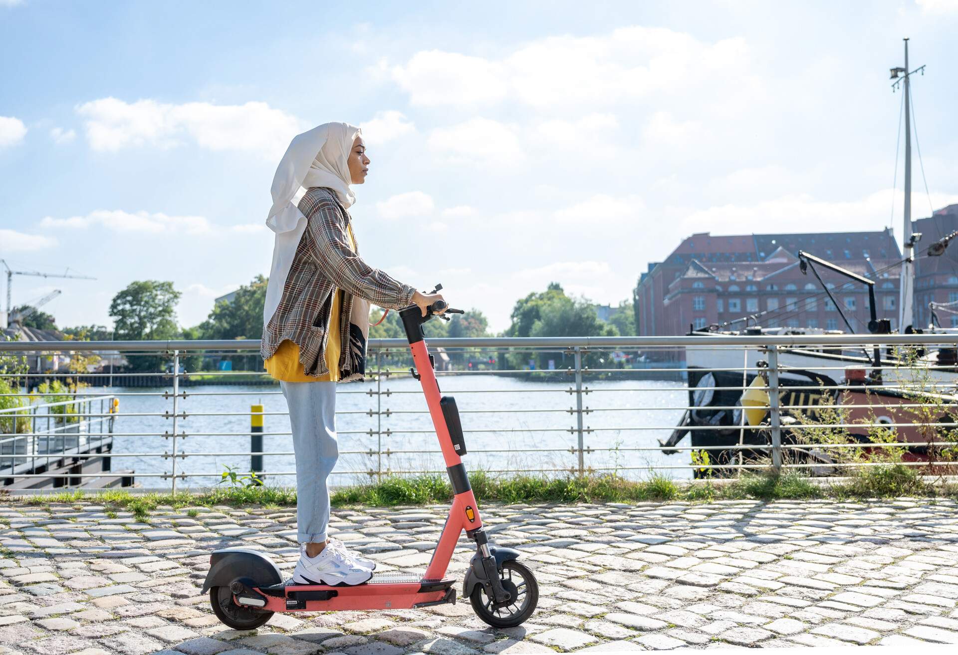 DEST_GERMANY_BERLIN_THEME_PEPLE_SCOOTER_GettyImages-1338882439