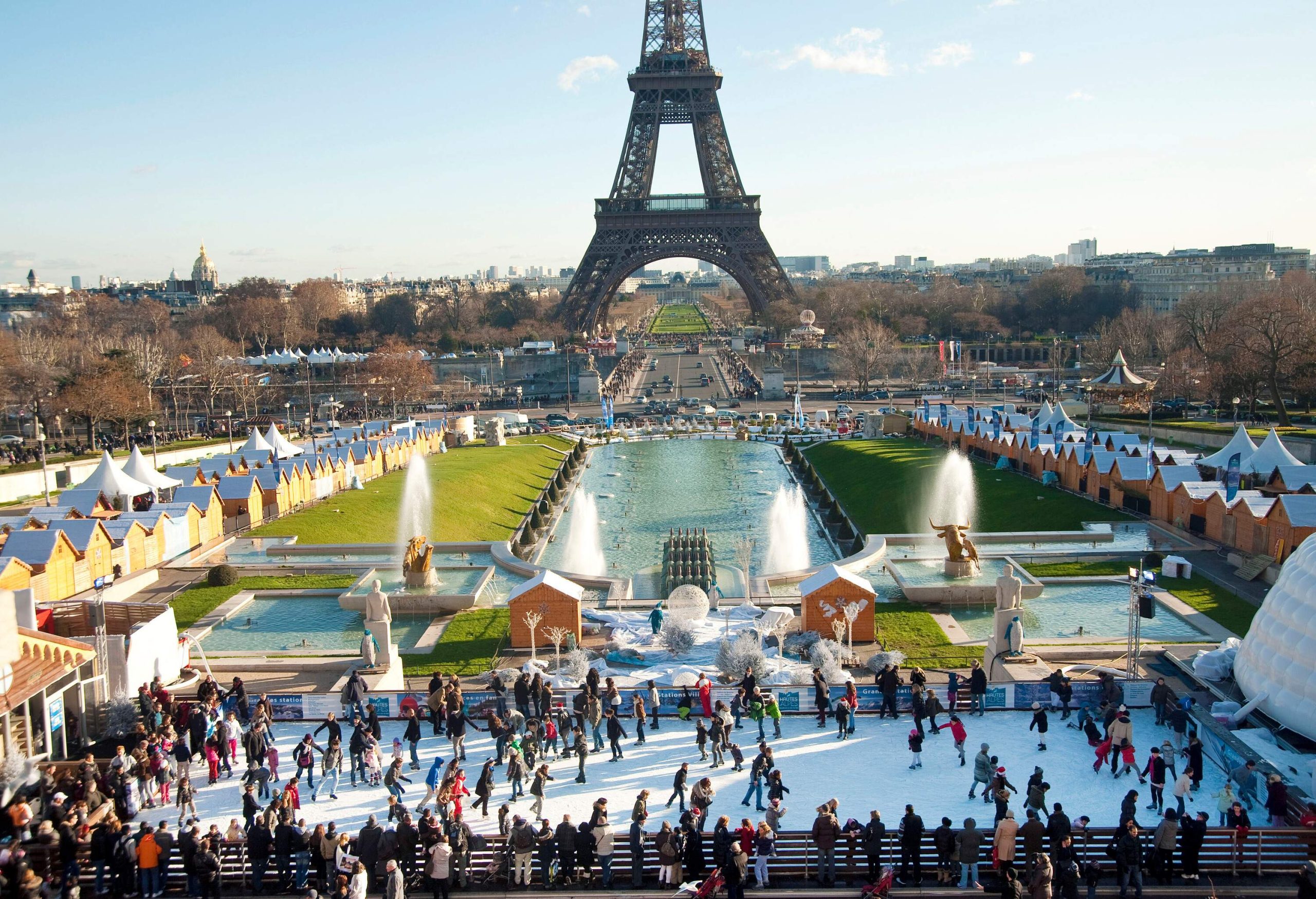 Ice skate rink during Christmas with Eiffel tower in background at Paris, France.