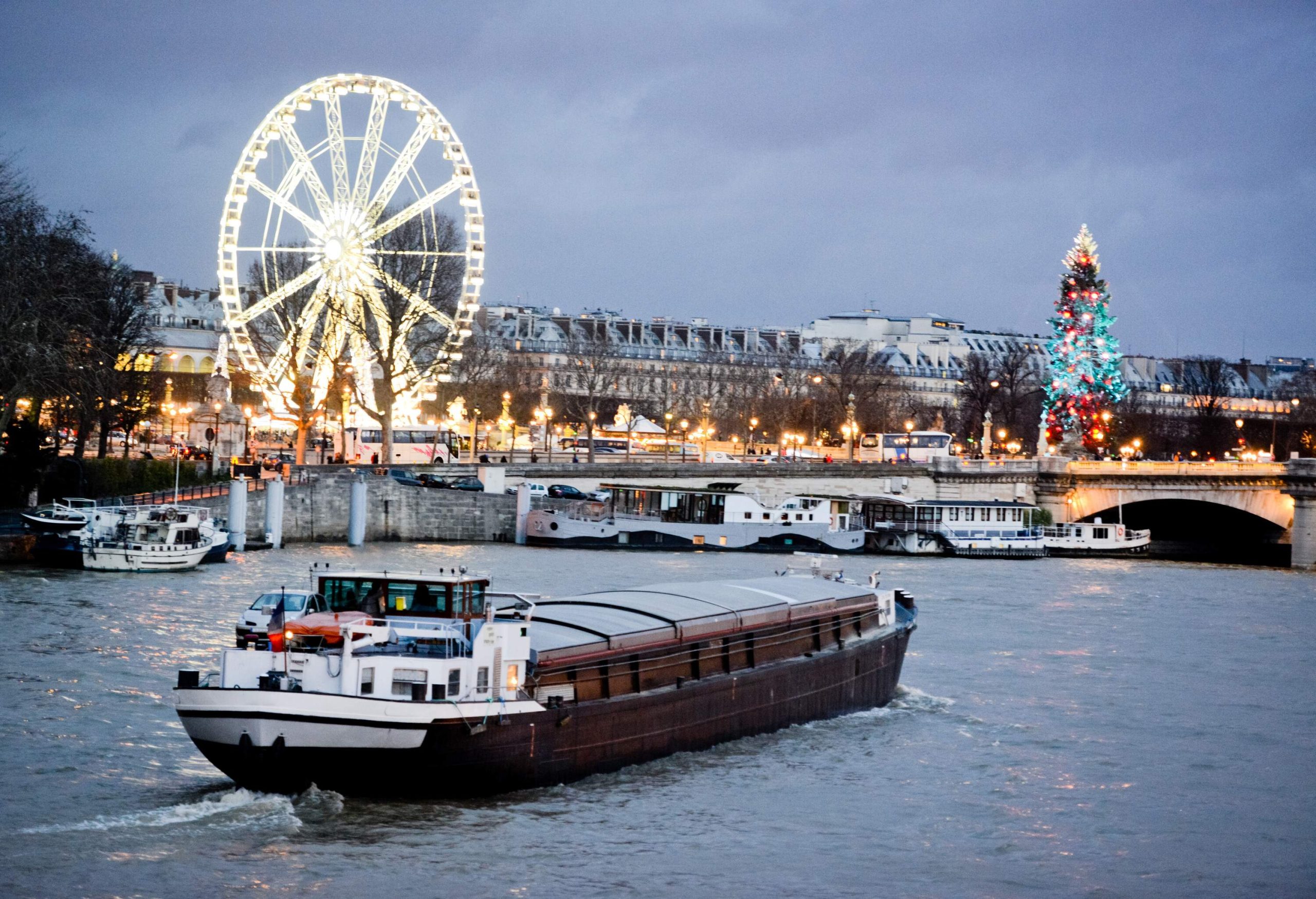 Christmas in Paris. Boat on Seine River