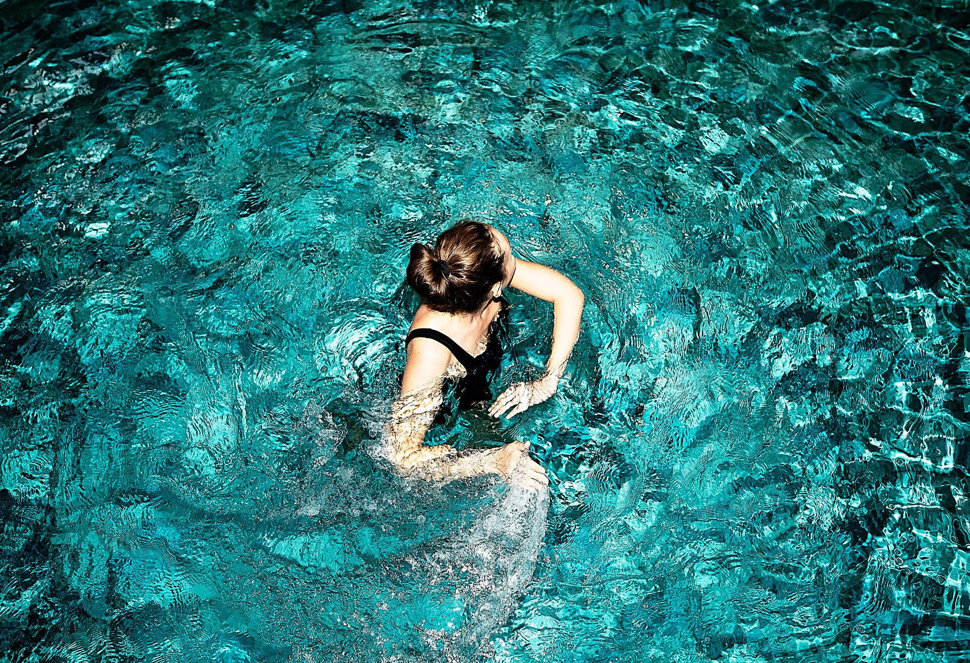 Woman swimming in the water