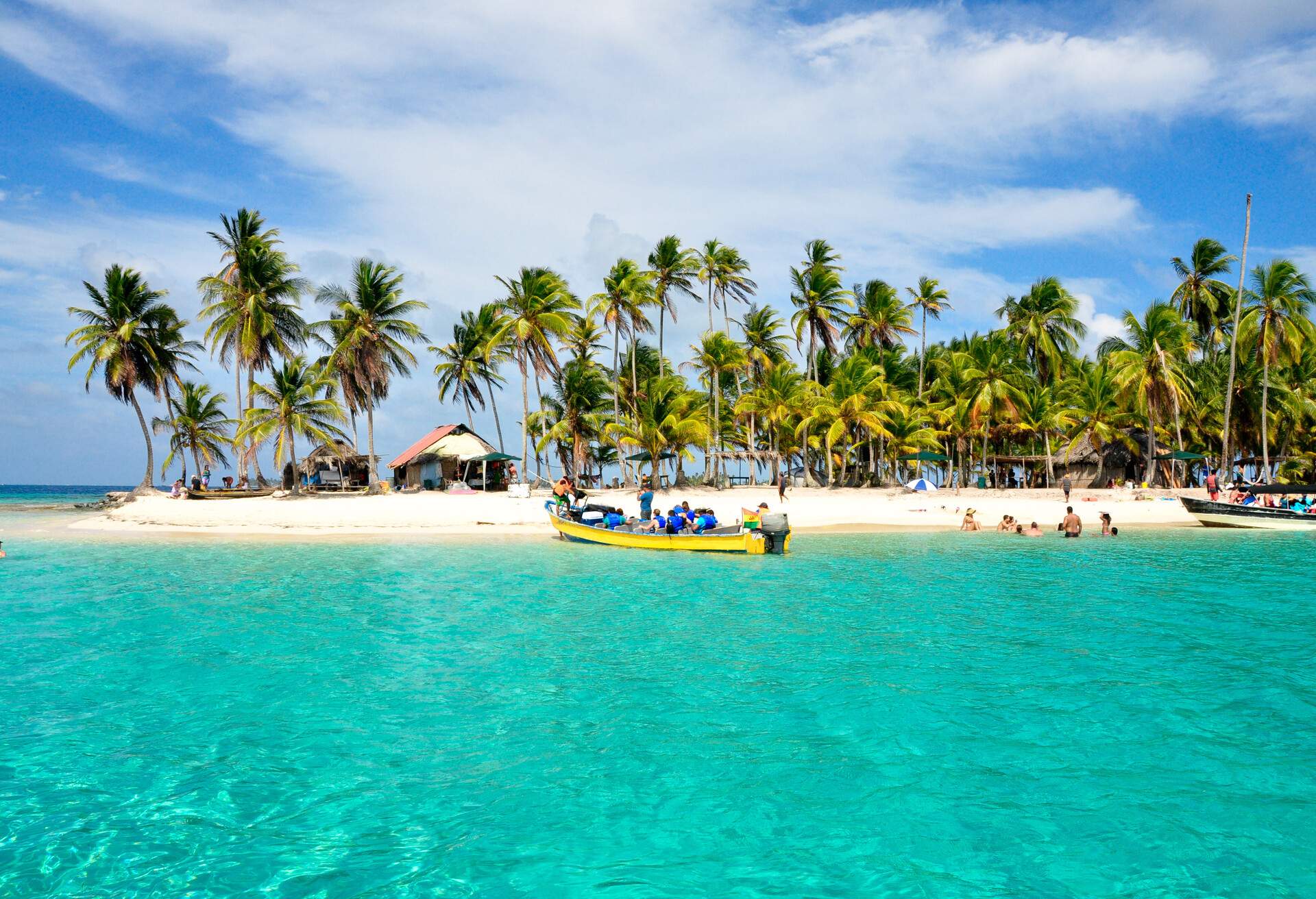 Beach view with boat at one of San Blas Islands, Panama.