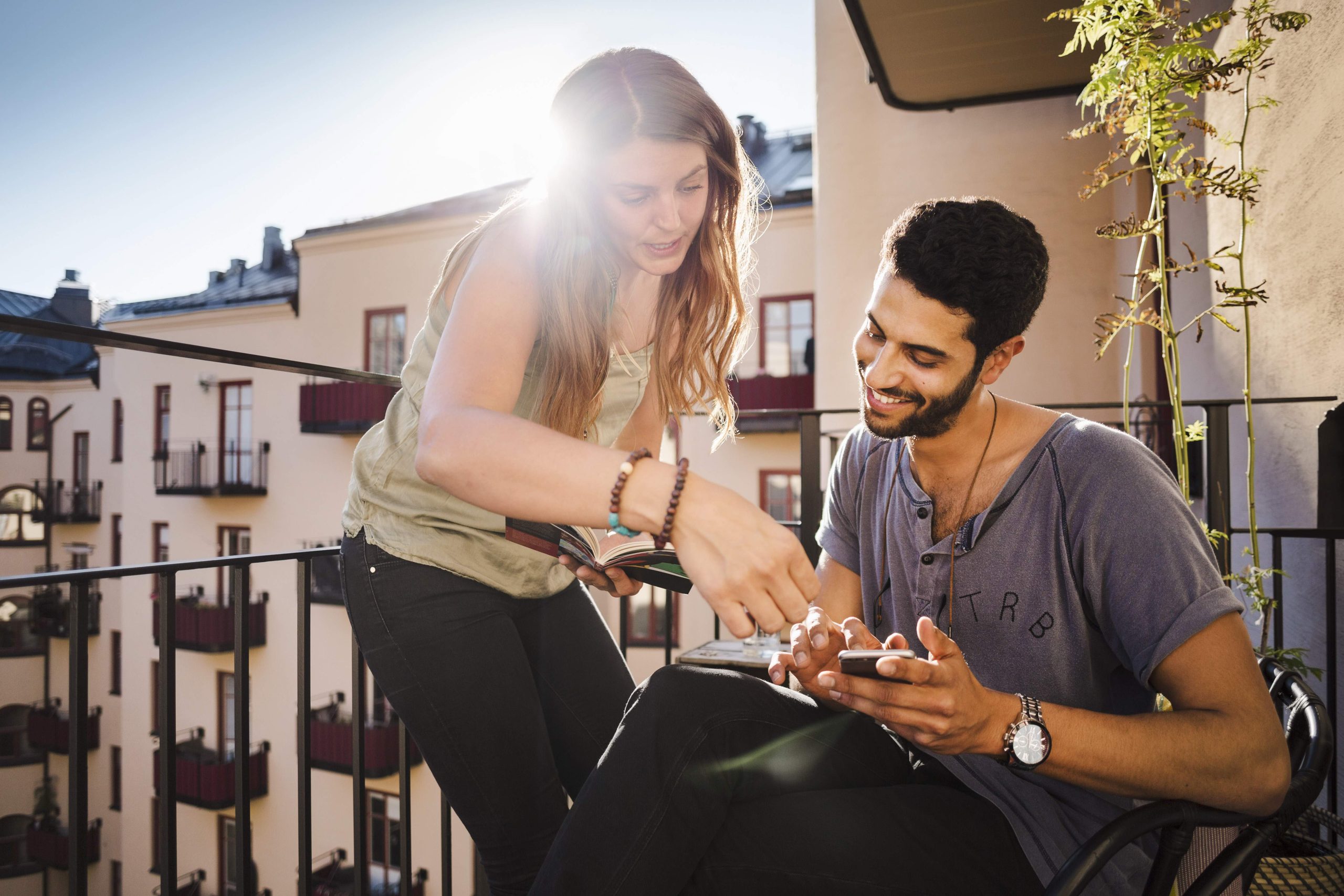 Couple checking detail before booking their flight