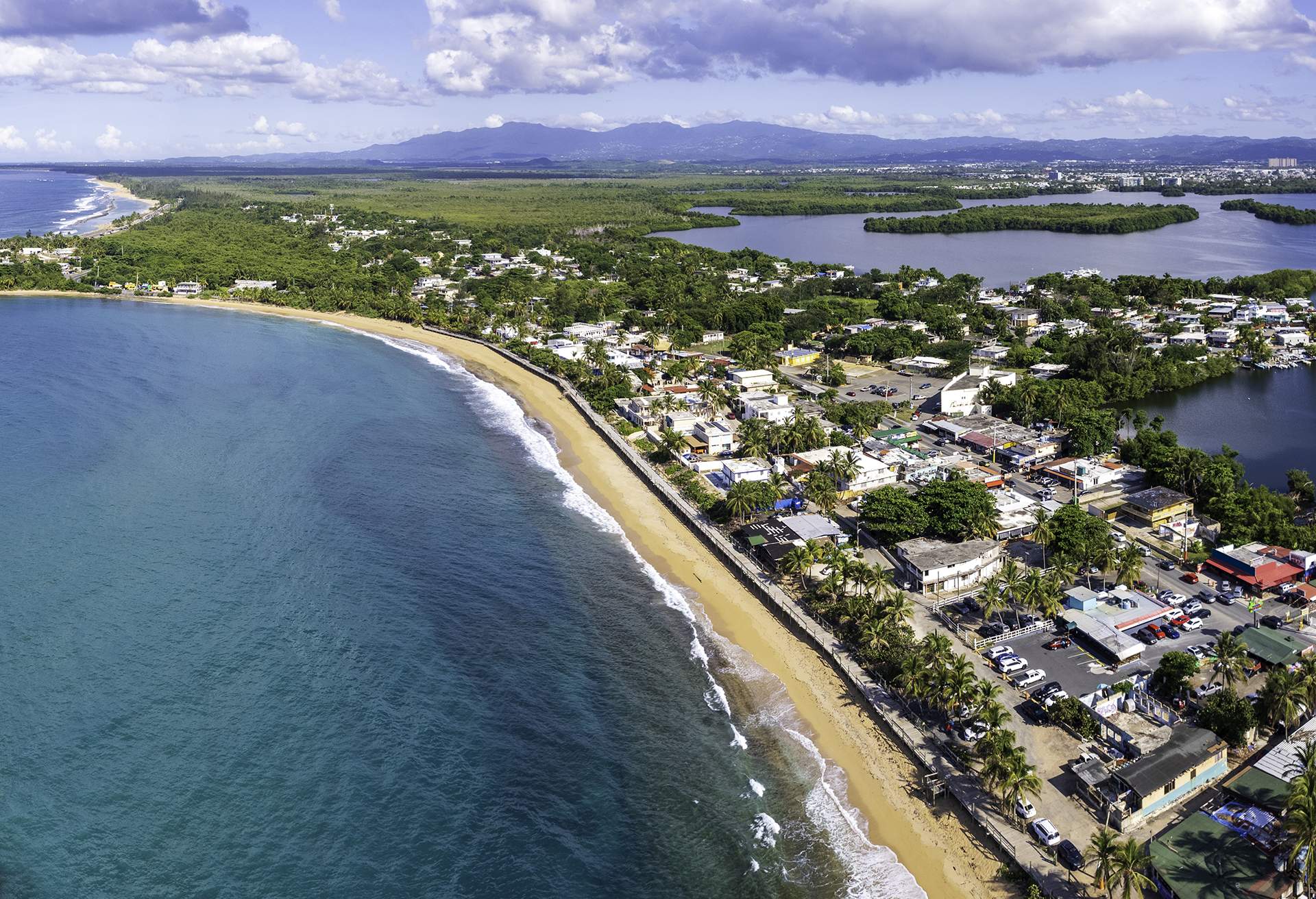 Aerial view of Caribbean beach and village, Puerto Rico