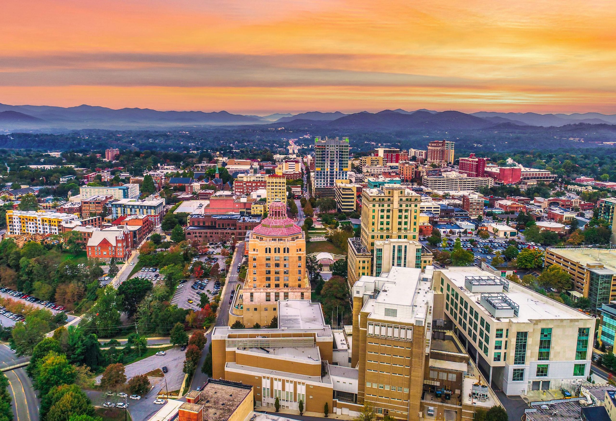 Aerial view of north American city at sunset on a summer day