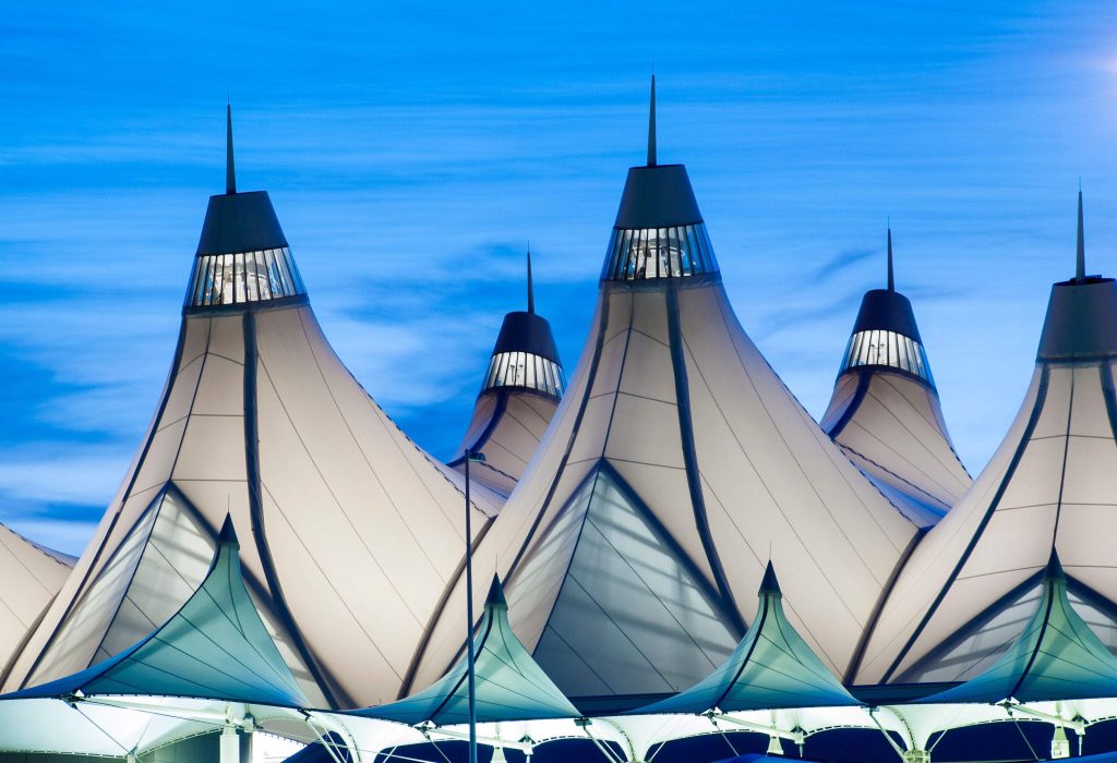 An airport's roof designed as glowing tents with sharp edges.