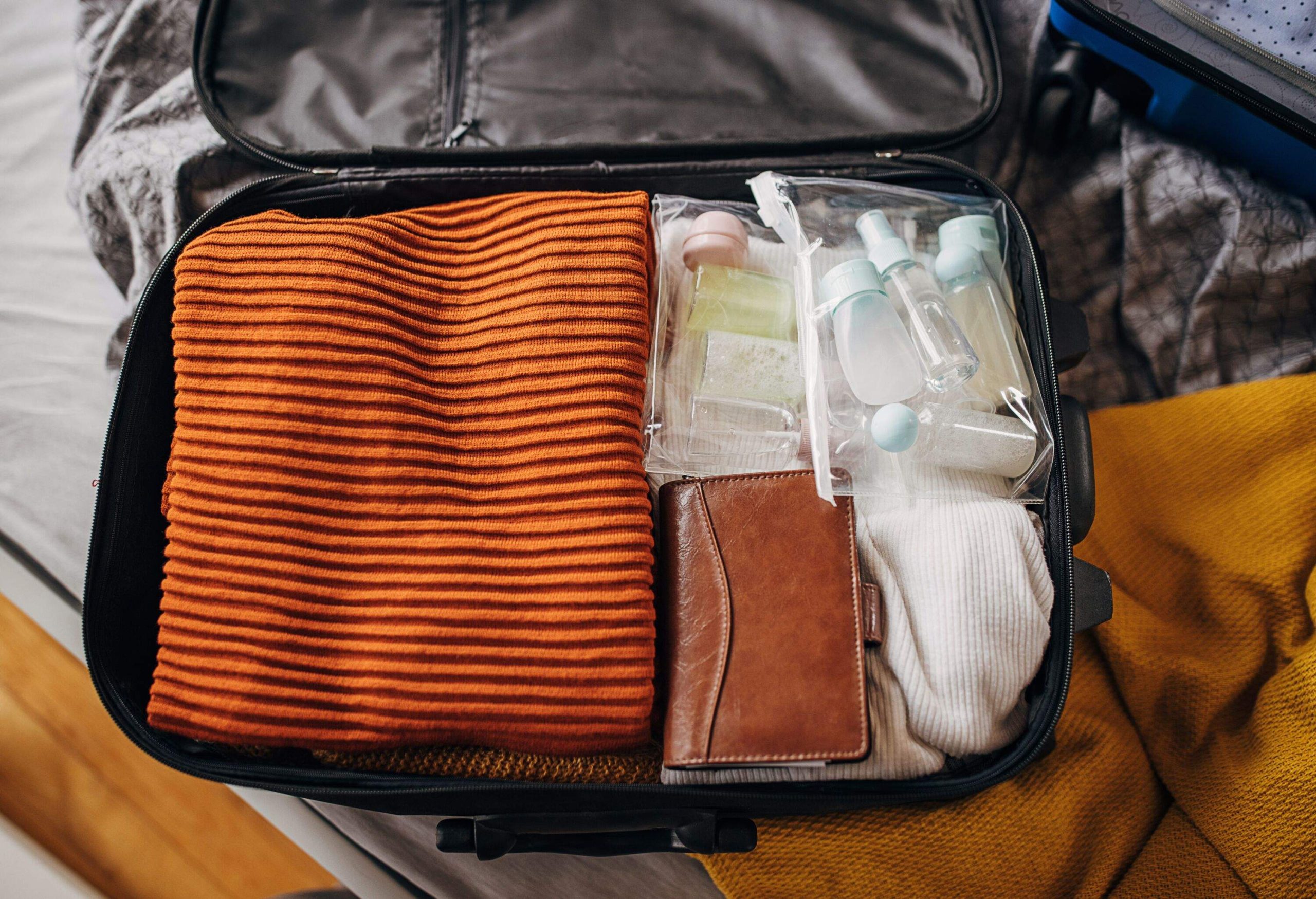 Clothes, cosmetics in the suitcases
