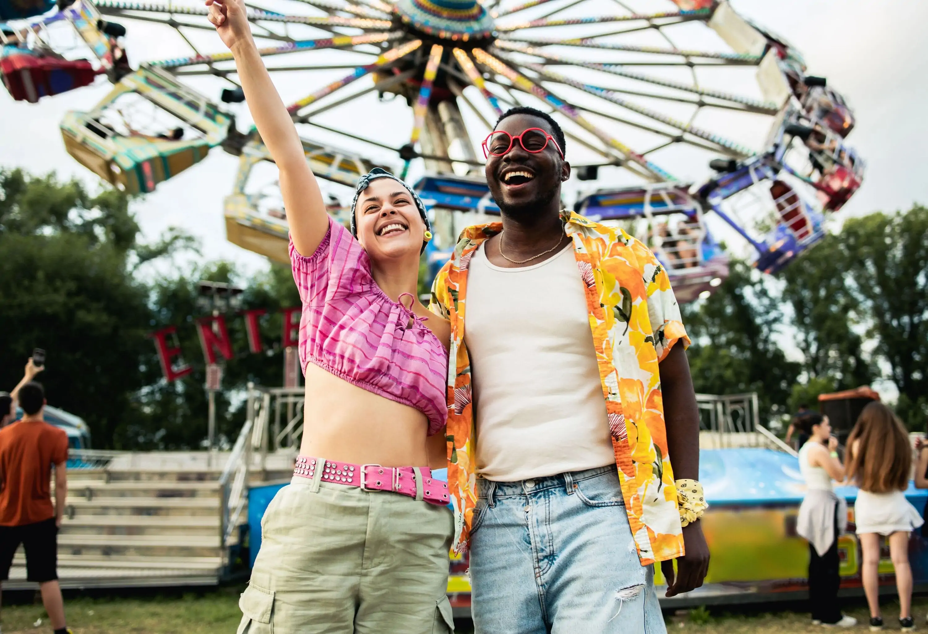 Young man and woman are having fun at the festival