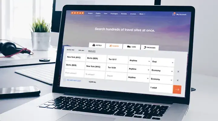 KAYAK flight search on laptop