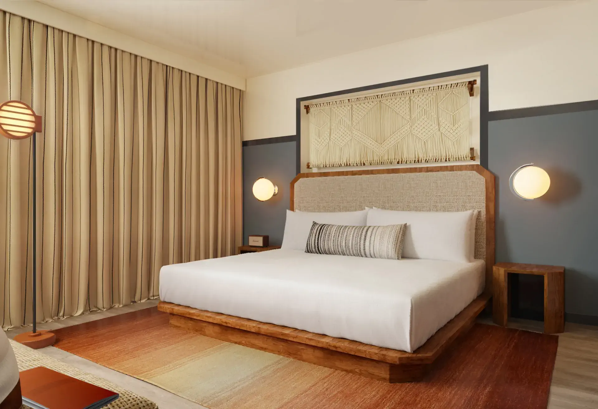 A well-made bed in a KAYAK Miami Beach guest room.