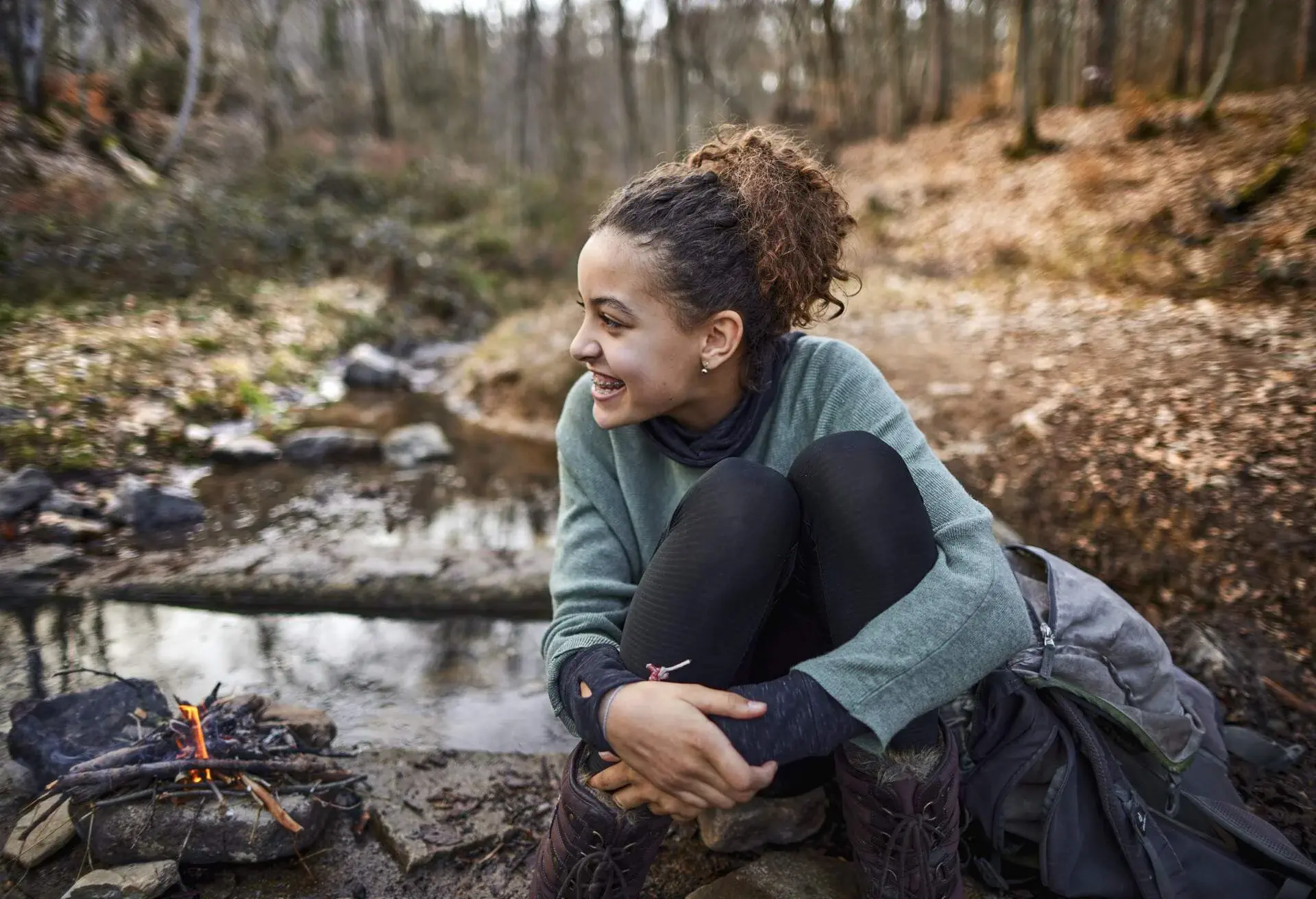 dest_germany_theme_hiking_camping_campfire_people_woman_gettyimages-1326255590_universal_within-usage-period_87918.jpg