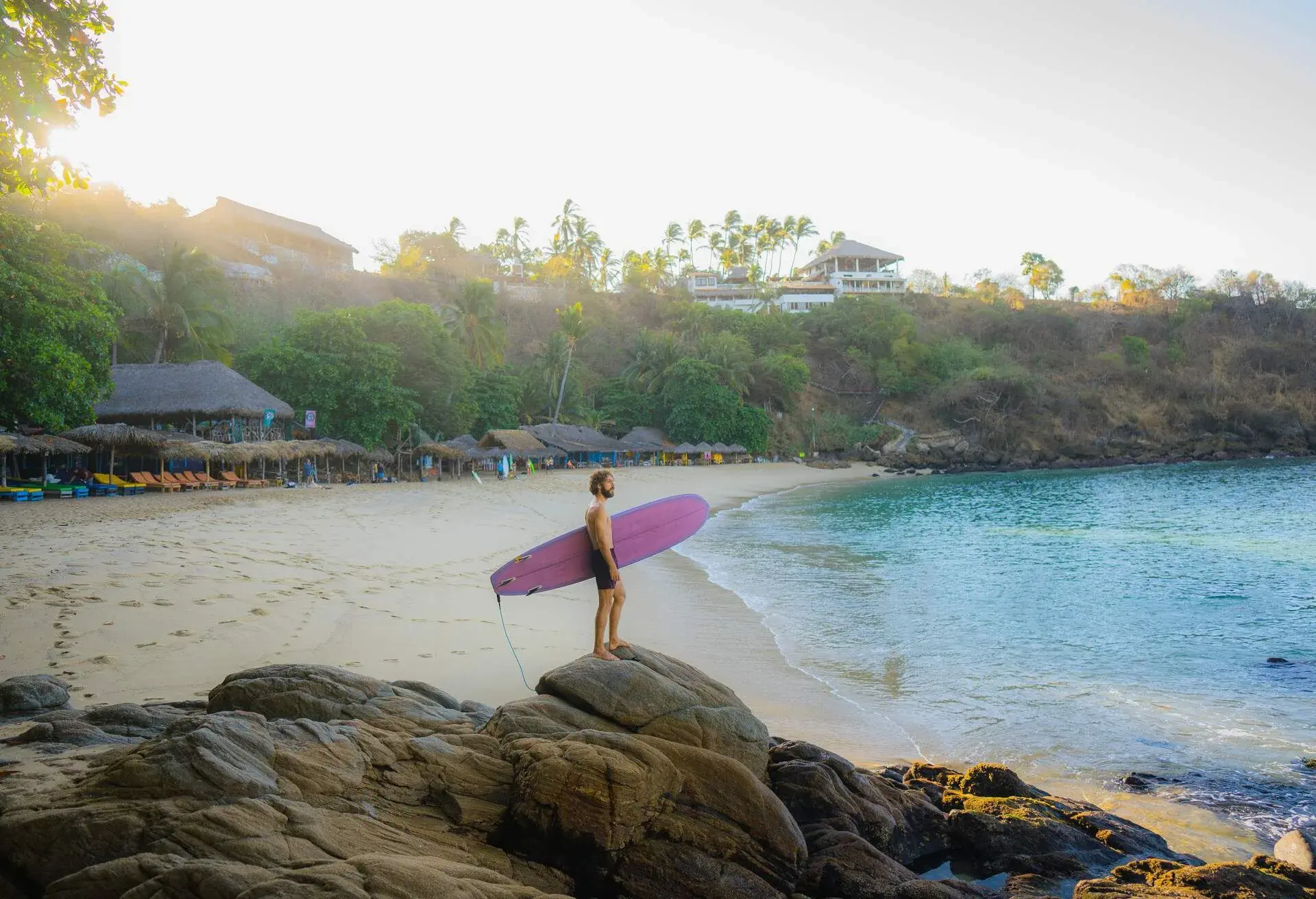 DEST_MEXICO_PUERTO_ESCONDIDO_SURFER_GettyImages-1397902943.jpg