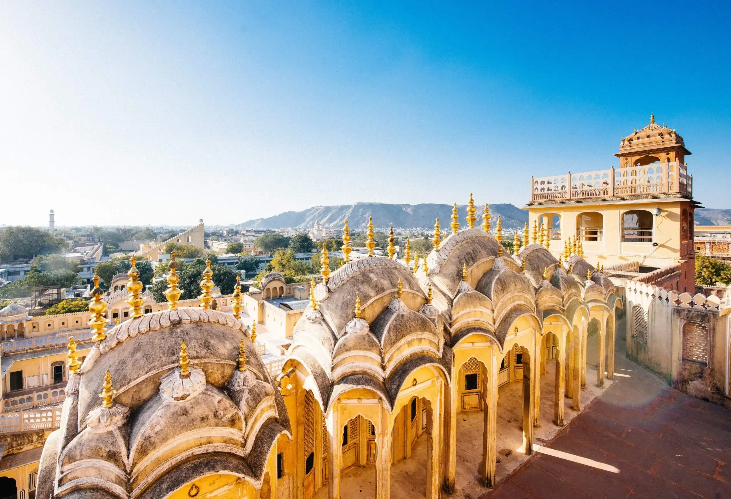 An exquisite architectural masterpiece adorned with an intricate honeycomb-like facade and ornate windows.
