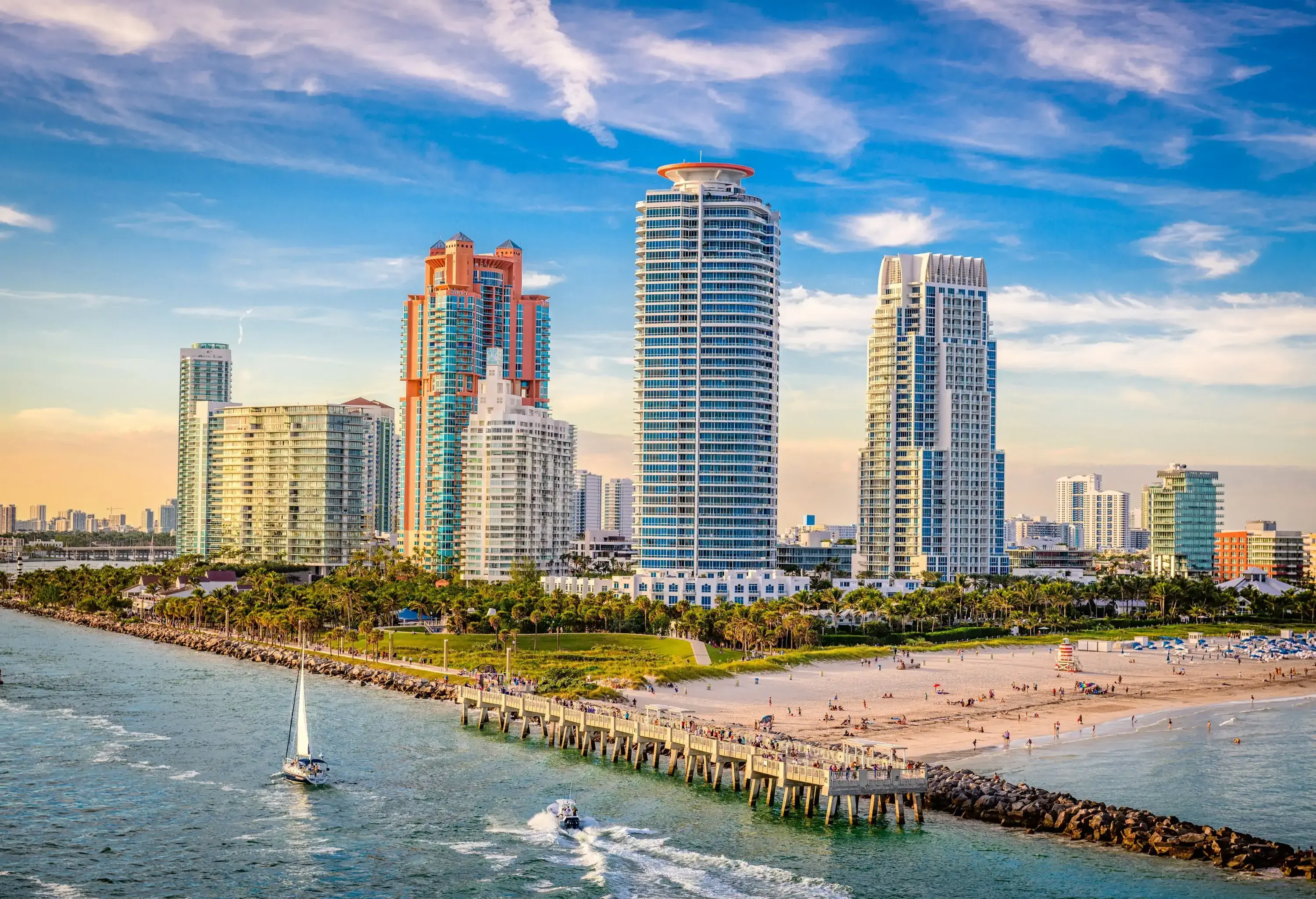 High-rise hotel buildings in front of the beach that provide an excellent vantage point for the ocean.