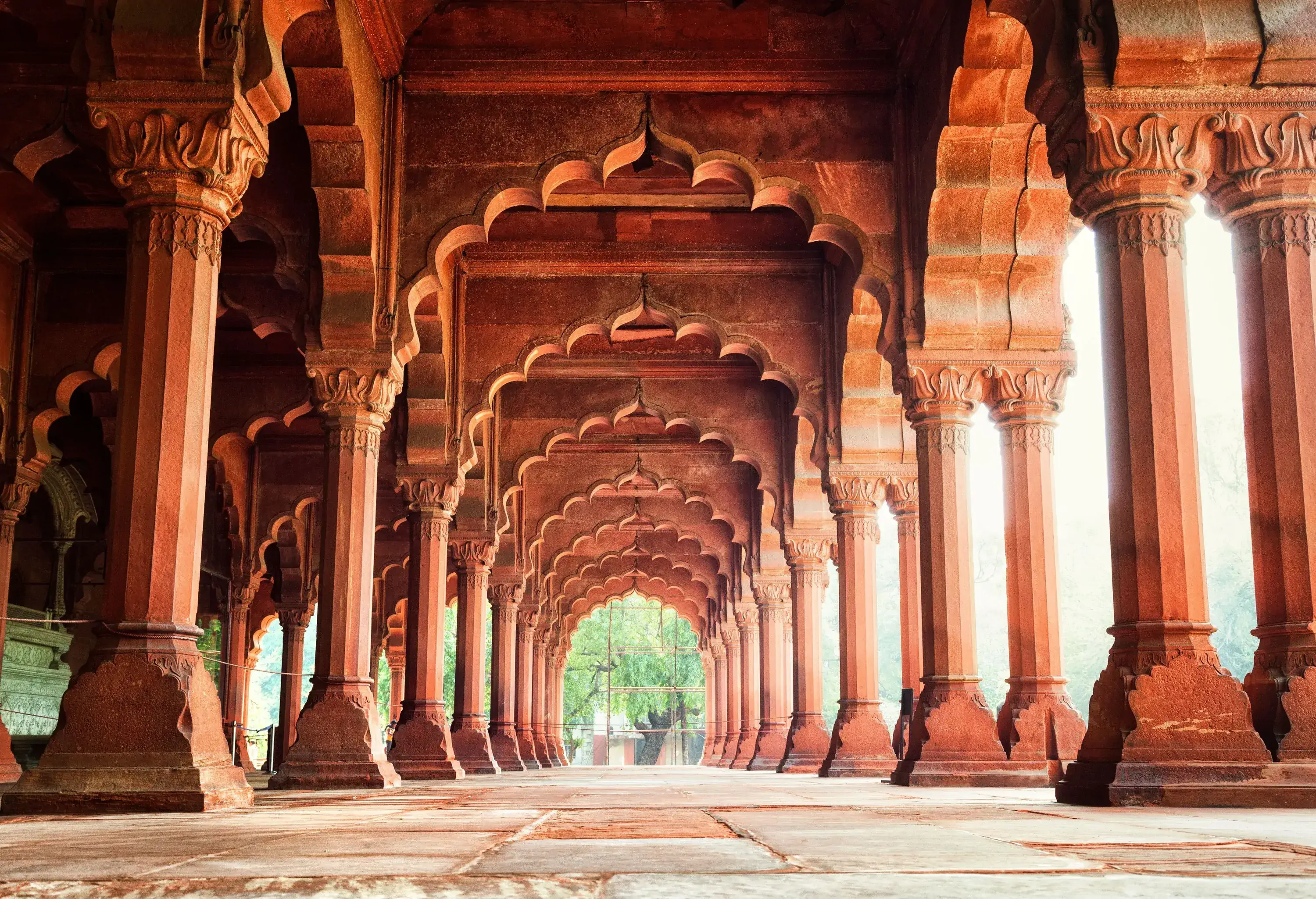 A column-supported hall with cusped arches in rows.