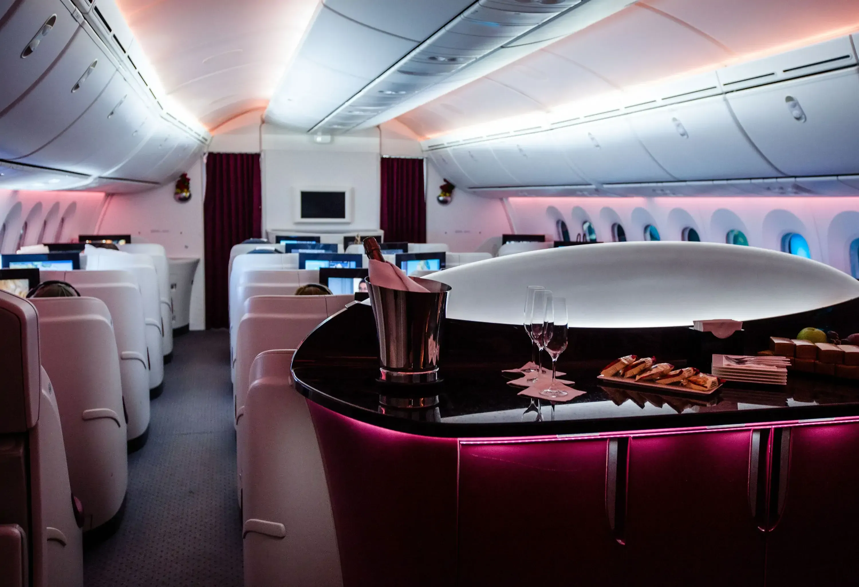 A captivating view of the empty business class cabin, exuding an air of luxury and exclusivity with plush seats, spacious legroom, and refined amenities.