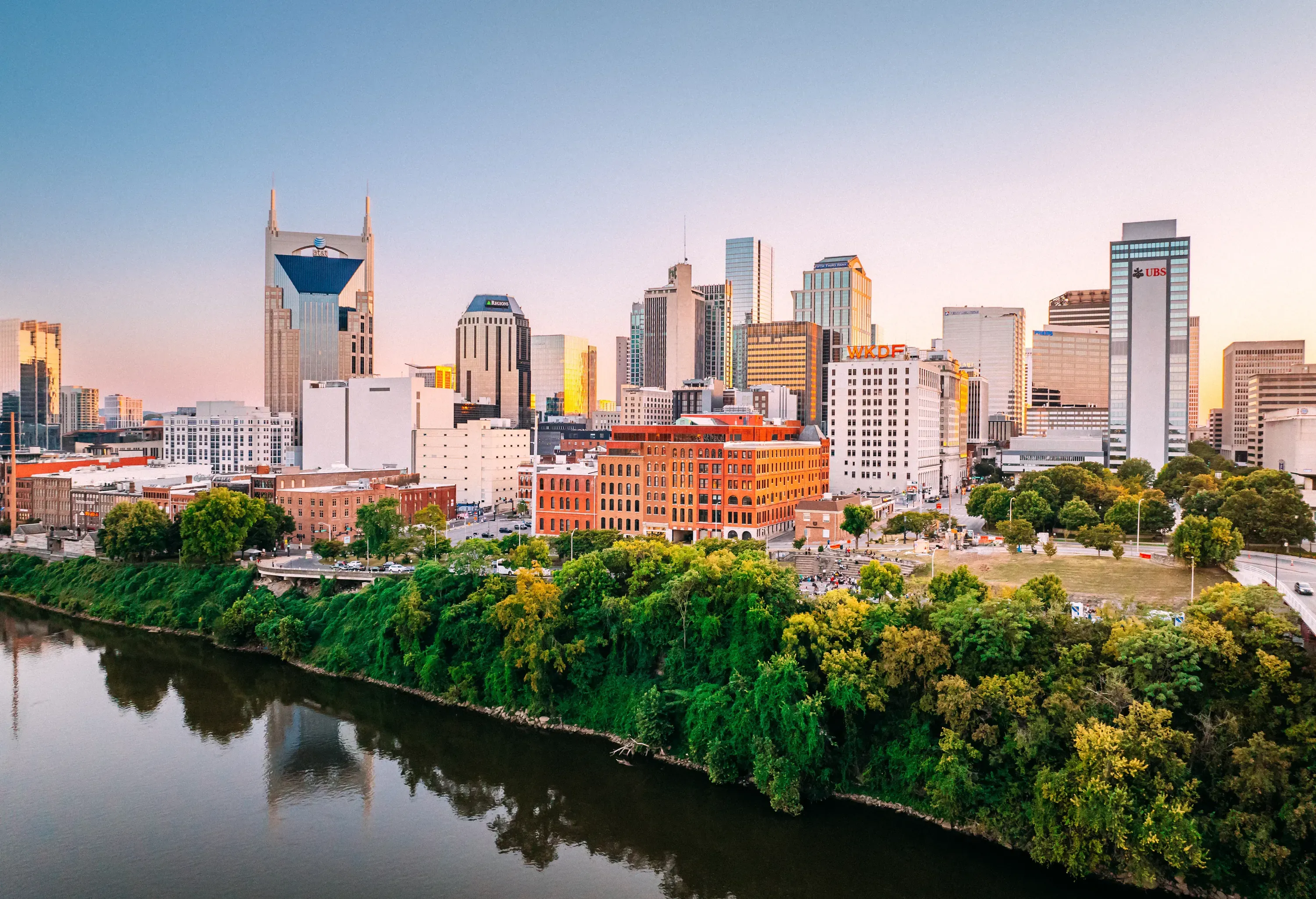 Aerial Perspective of Broadway, Downtown Nashville, Tennessee Skyline from the Northeast Bank of the Cumberland River near the Stadium on a Slow Weeknight