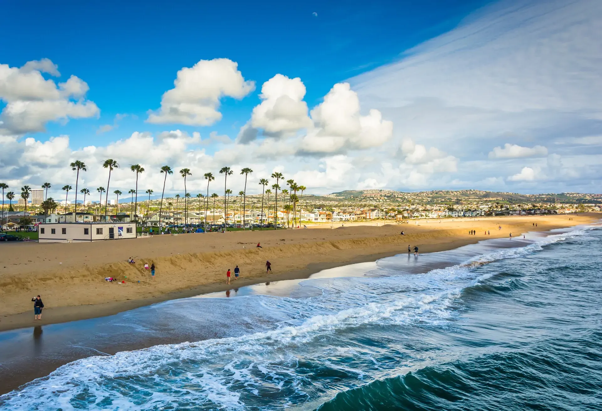 Waves in the Pacific Ocean and view of the beach from Balboa Pier in Newport Beach, California; Shutterstock ID 256982434