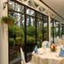 Perkasa Hotel Mt Kinabalu dining room with garden views and set tables in Kampung Kigiok