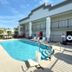 Econo Lodge Lenoir City - Knoxville Area poolside outdoor pool with lounge chairs and building exterior