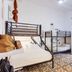 Granny's Inn Hostel Sliema dorm room with bunk beds and patterned tile floor