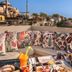 Henna Hotel Istanbul rooftop terrace with breakfast, cushions, and Istanbul city views