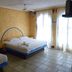 Hotel Casa Vieja in Puerto Escondido room with two beds and bright windows