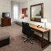 Residence Inn by Marriott Fort Worth Cultural District room with sofa, desk, TV and bed