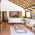 Pousada Outeiro in Trancoso with open-air lounge, kitchen island, and seating area