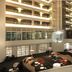 AC Hotels by Marriott Ambassadeur Antibes- Juan les Pins atrium with curved seating and glass balconies in Antibes