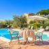 Agriturismo - B&B L'Acquacotta in Castiglione della Pescaia, poolside table with umbrellas