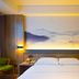 Anyi 158 Hotel Renming Park in Chengdu guest room with twin bed, mountain mural, and wall sconces