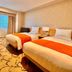 Hotel Rose Garden Shinjuku Tokyo twin guest room with two beds and window curtains