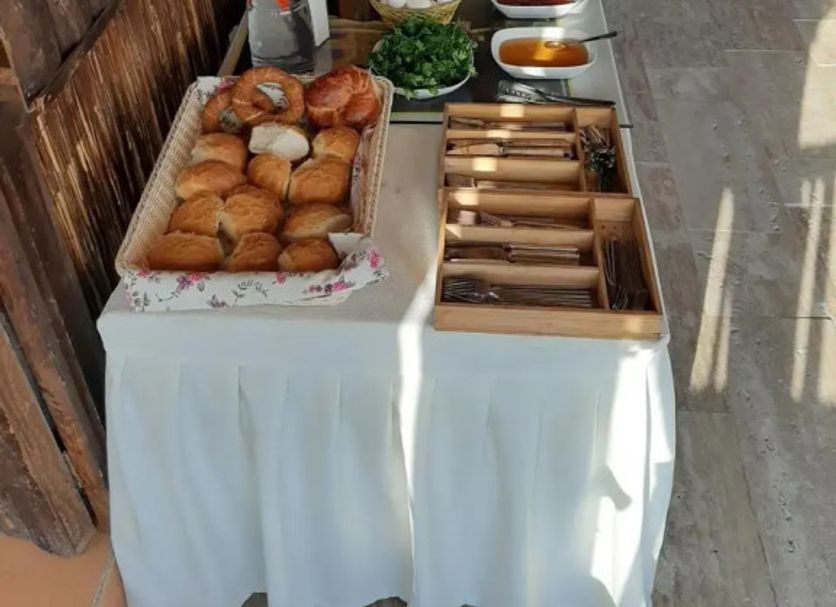 Seven Rock Cave Hotel in Göreme breakfast buffet with pastries, eggs, salads, and condiments on a long table