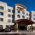 Residence Inn by Marriott Fort Worth Cultural District exterior with arched entrance and parking lot