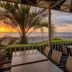 Holiday Inn & Suites Virginia Beach - North Beach patio dining with ocean sunset views