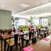 Appart'City Classic Genève - Gaillard dining room with bright lime and black chairs