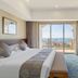 Haiqing Hotel Qingdao guest room with balcony and sea view