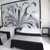 Hotel Maya del Mar in Playa del Carmen twin beds with black-and-white palm mural