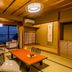 Ooedo Onsen Monogatari Wanwan Resort Yataya Shotoen in Kaga: tatami room with ocean view and seating