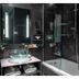 LYRIC Hotel Paris Opera bathroom with glass vessel sink and shower-over-bathtub in Paris
